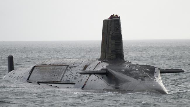 LARGS, SCOTLAND - FEBRUARY 27:  In this handout image provided by MoD Crown Copyright, HMS Vengeance departs for Devonport prior to re-fit on Ferbruary 27, 2012 off the coast of Largs, Scotland. The UK Ministry of Defence has awarded UK's leading naval support business Babcock, on March 25, 2012, with a contract to commence the planning phase for the ÃÂ£350 million GBP refit of Trident ballistic missile submarine HMS Vengeance, which will be undertaken at their Devonport Royal Dockyard. The project to upgrade and refuel the nuclear submarine will safeguard 2,000 UK jobs and will take around three and a half years. River Tamar shipping was suspended when the the 150m-long, 15,900-tonne submarine HMS Vengeance travelled to the Devonport Dockyard ahead of the scheduled refit on March 2, 2012, arriving amid concerns without a signed contract for the refit.  HMS Vengeance will be the last of four Vanguard class submarines to undergo a Lond Overhaul Period and Refuel LOP(R) at Davernport that will commence once HMS Vigilant leaves Devonport on completion of her LOP(R) in 2012. Mandatory Credit: (Photo by Andrew Linnett/MoD Crown Copyright via Getty Images)