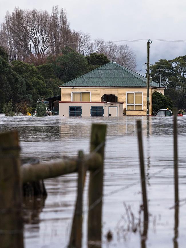 The Mersey River breaks its banks and floods several small towns cutting of road access across the coast on June 6, 2016 in Latrobe. (Photo by Heath Holden/Getty Images)