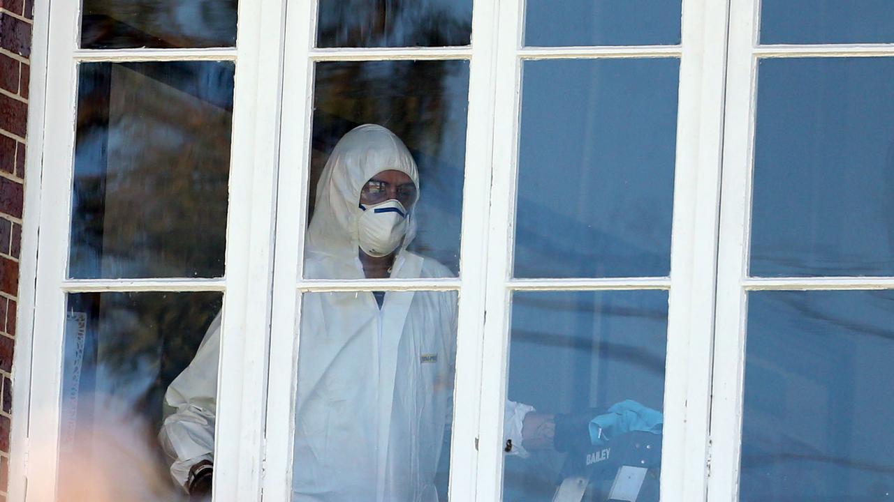 The cluster quickly spread through schools. Cleaners inside Ironside State School, St Lucia. Picture: Zak Simmonds