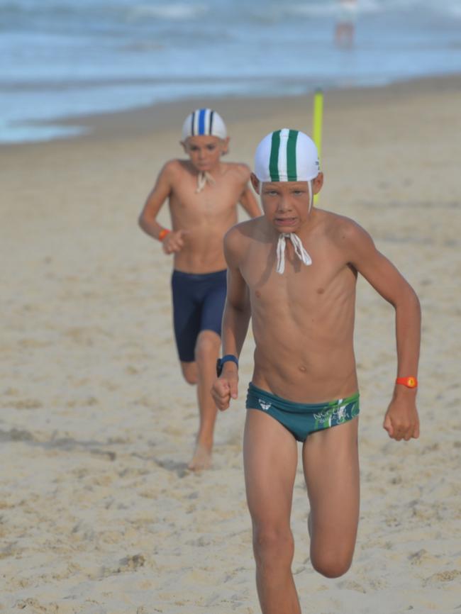 Running action at the Queensland Youth Surf Life Saving Championships on February 17.