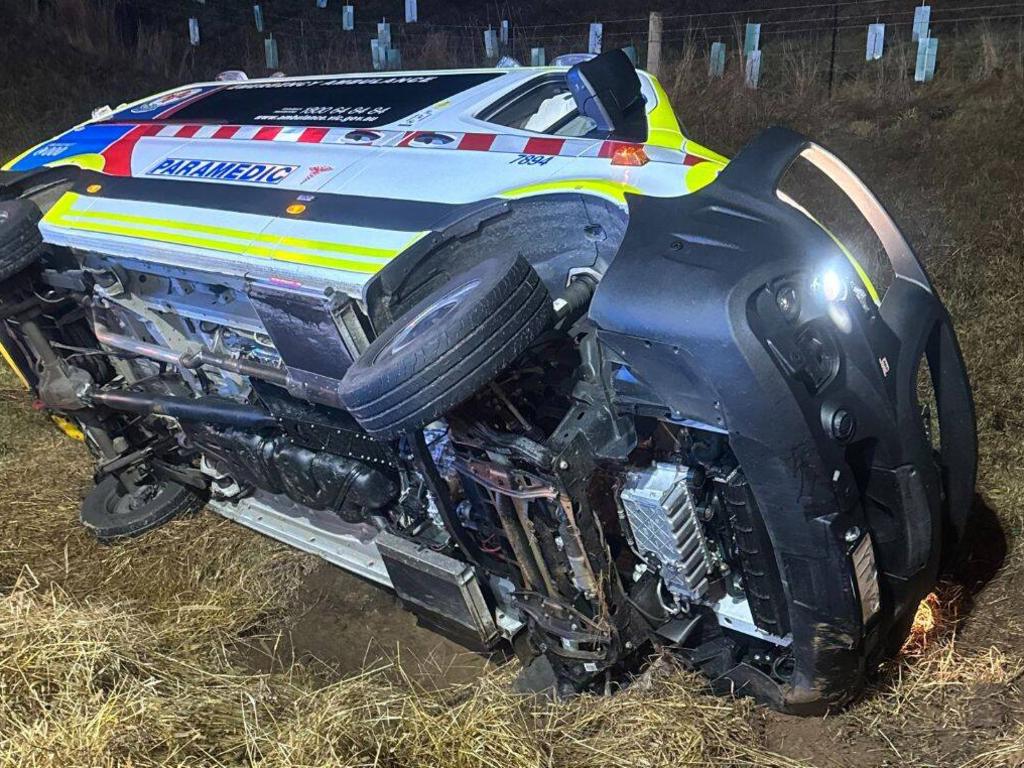 The ambulance hit an embankment at 90km/h and rolled onto its side. Picture: 3AW