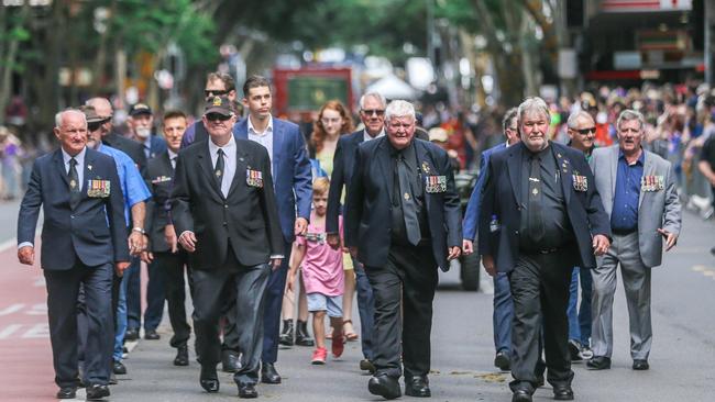 2nd Battalion on the march as thousands line Adelaide St in Brisbane for the 2023 ANZAC Day March.Picture: NCA NewsWire / Glenn Campbell
