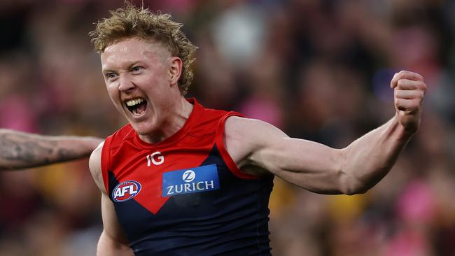 MELBOURNE, AUSTRALIA - August 20, 2023. AFL .  Clayton Oliver of the Demons celebrates a 4th quarter goal during the round 23 match between Melbourne and Hawthorn the MCG in Melbourne, Australia.  Photo by Michael Klein.