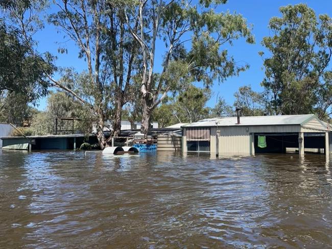 ADELAIDE, AUSTRALIA - Advertiser Photos DECEMBER 30, 2022: Joel Eglinton canoes around his families Murray River shacks to document the extent of flooding from the rising Murray River waters at Swan Reach, SA.  Picture Supplied Joel Eglinton