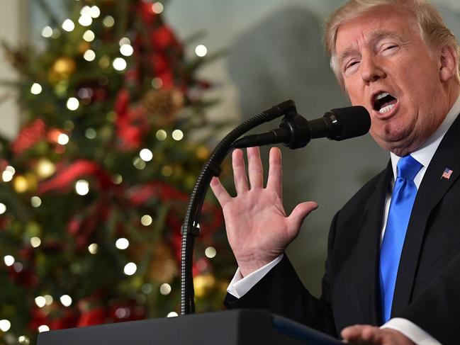 US President Donald Trump delivers a statement on Jerusalem from the Diplomatic Reception Room of the White House in Washington, DC on December 6, 2017.  President Donald Trump on Wednesday recognized the disputed city of Jerusalem as Israel's capital -- a historic decision that overturns decades of US policy and risks triggering a fresh spasm of violence in the Middle East.