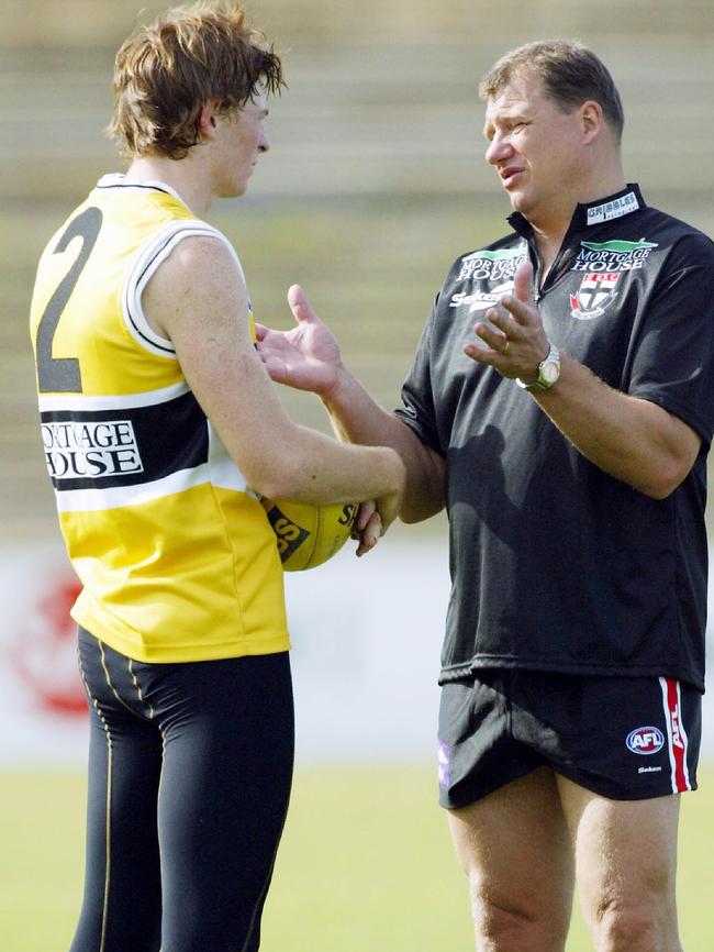 Brendon Goddard chats with former St Kilda coach Grant Thomas at training.