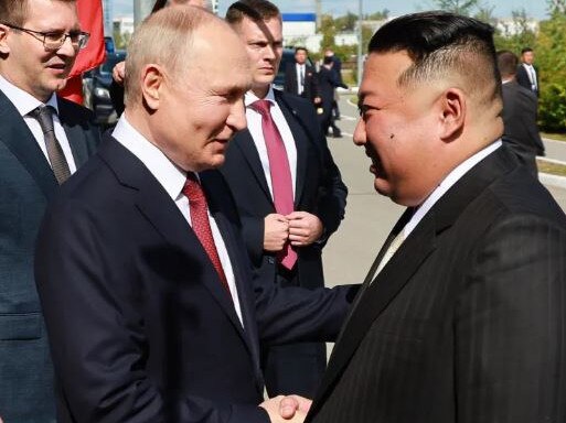 Vladimir Putin and Kim Jong-un shake hands as they meet in Tsiolkovsky. Picture: Supplied