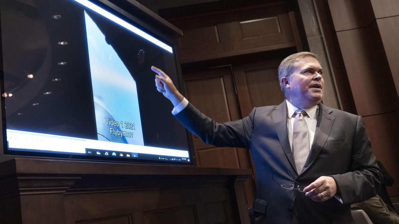 US deputy director of naval intelligence Scott Bray shows a video of unidentified aerial phenomena to the House Intelligence Committee subcommittee hearing. Picture: Kevin Dietsch/Getty Images/AFP
