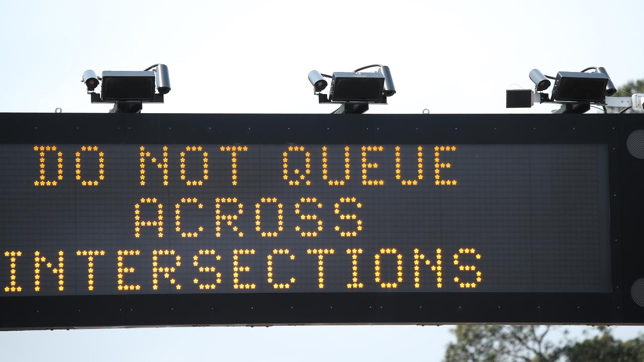 Three of the cameras are pictured fixed to a traffic sign on Anzac Parade at Moore Park near Alison Road. Picture: David Swift.