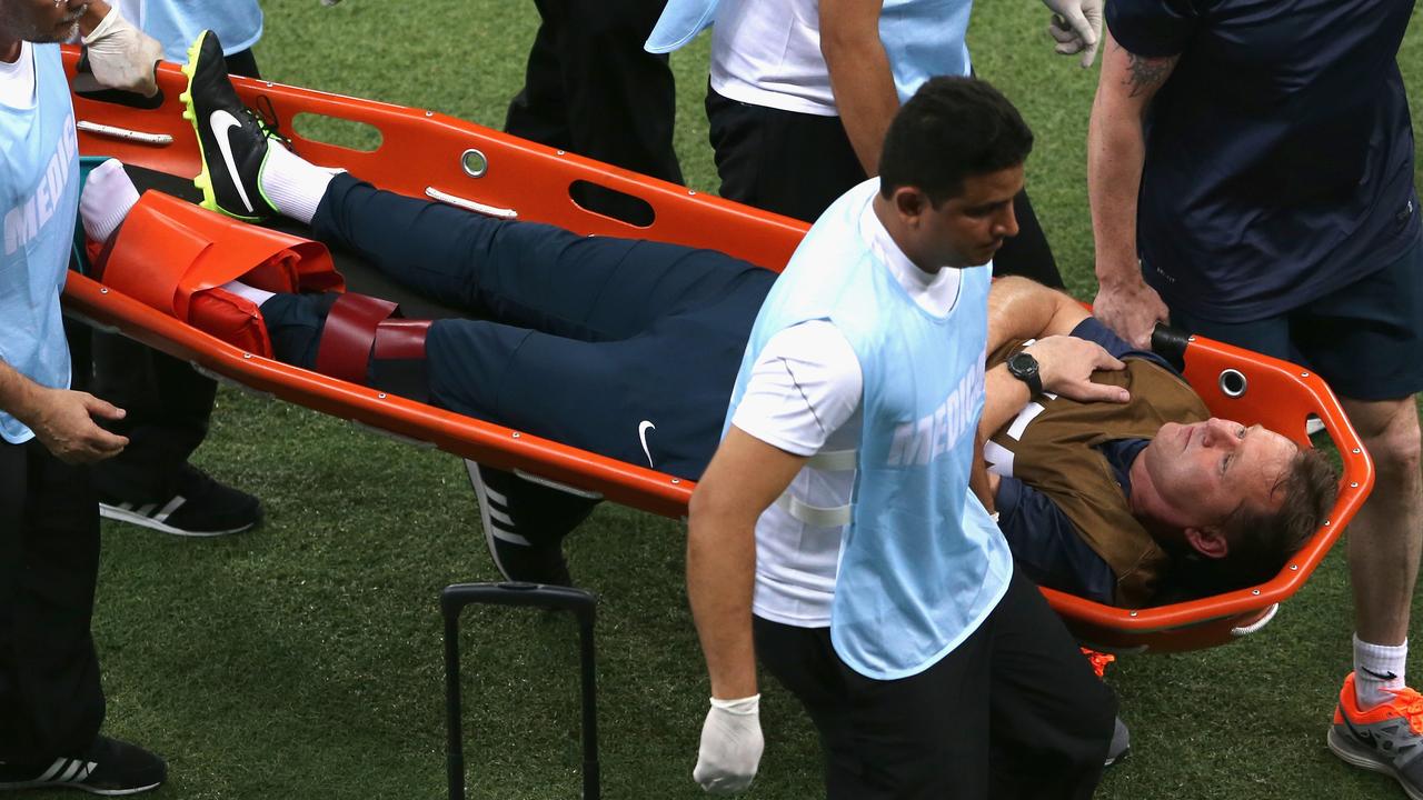 MANAUS, BRAZIL - JUNE 14: England trainer Gary Lewin is stretchered off the field after a leg injury during the 2014 FIFA World Cup Brazil Group D match between England and Italy at Arena Amazonia on June 14, 2014 in Manaus, Brazil. (Photo by Warren Little/Getty Images)