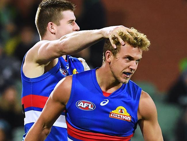 ADELAIDE, AUSTRALIA - JUNE 14:  Mitch Wallis of the Bulldogs celebrates a goal  during the round 13 AFL match between Port Adelaide Power and the Western Bulldogs at Adelaide Oval on June 14, 2018 in Adelaide, Australia.  (Photo by Mark Brake/Getty Images)