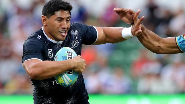 “Like witches hats at training” ... Jason Taumalolo brushes away a tackler in the NRL Nines semi-final. Picture: Richard Wainwright/AAP