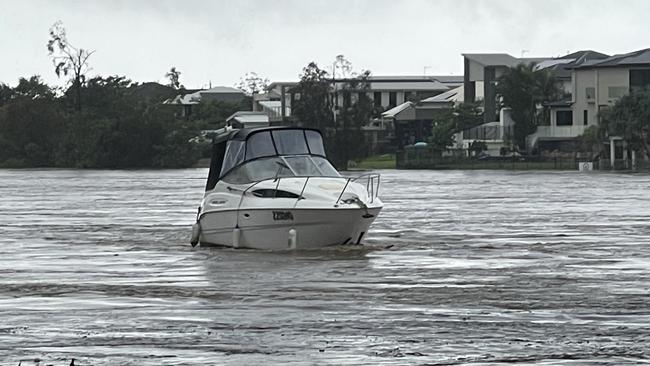 Boats, trampolines and pontoons have been swept away in flood waters across the Gold Coast. Picture: Charlton Hart