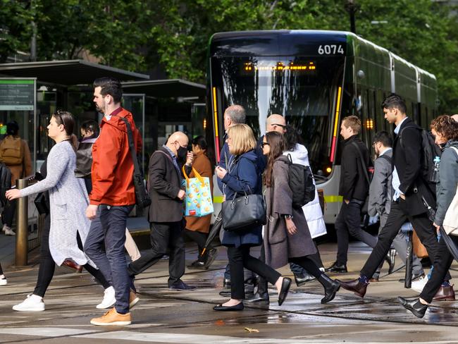 MELBOURNE, AUSTRALIA - NewsWire Photos NOVEMBER 03, 2022 : Early morning workers arrive in the city on a brisk Melbourne morning. Picture NCA NewsWire / Ian Currie