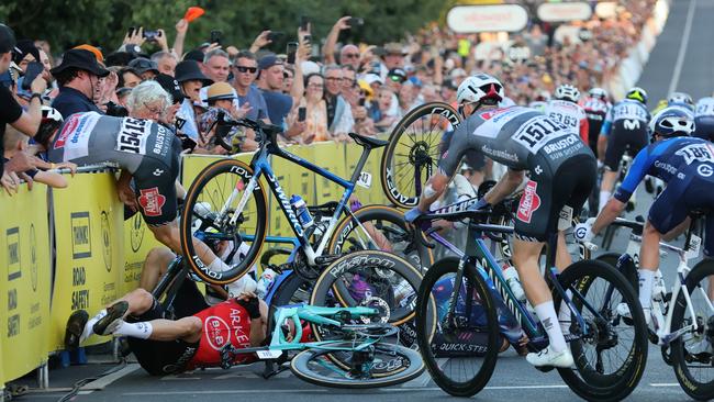 ADELAIDE, AUSTRALIA - JANUARY 18: Crash on last corner with multiple riders during day two of the Tour Down Under on January 18, 2025 in Adelaide, Australia. (Photo by Sarah Reed/Getty Images)