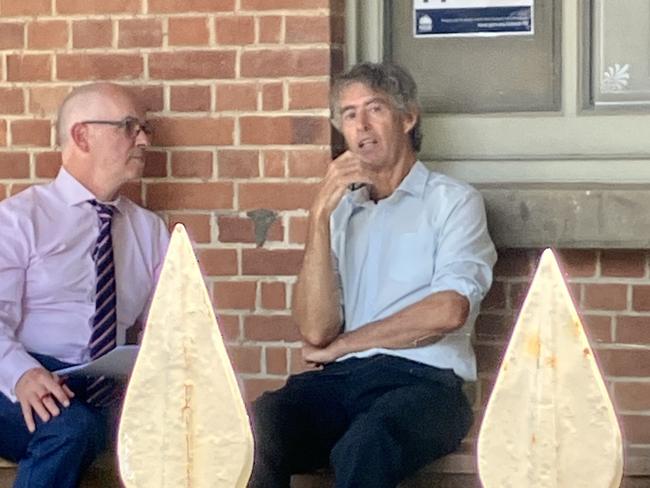 Michael Jones (right) with his lawyer outside Grafton Local Court.