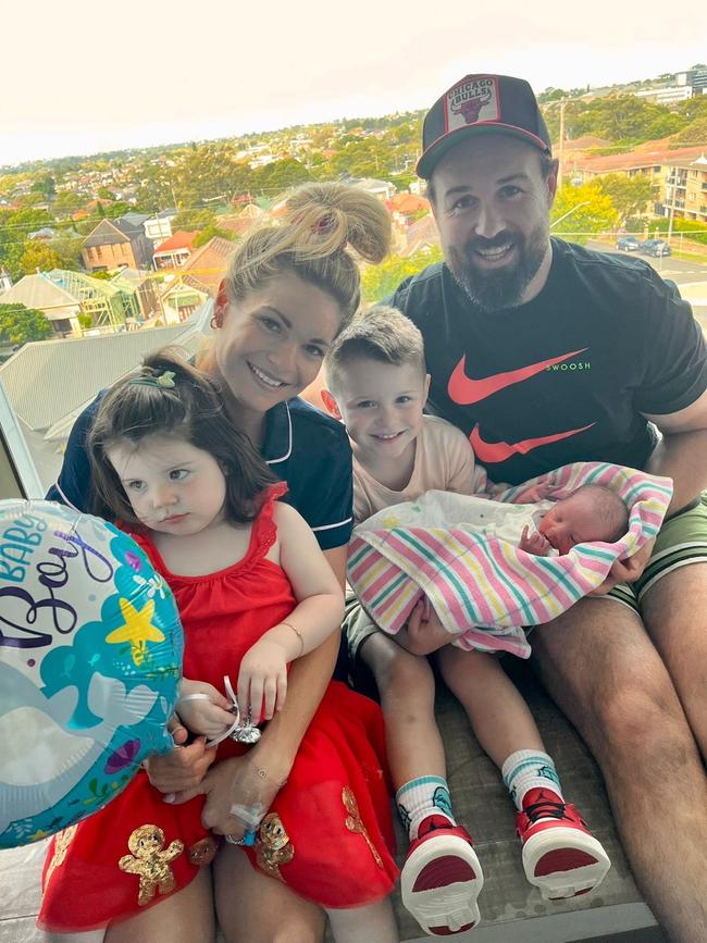 Aaron Woods with his family. Credit: Supplied.