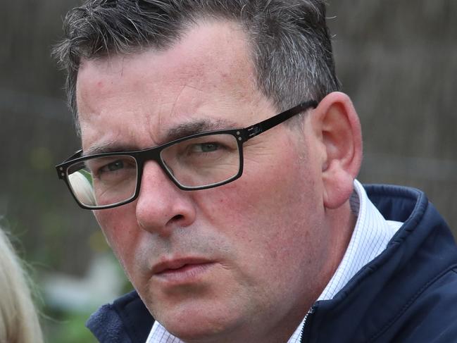 MELBOURNE, AUSTRALIA - NewsWire Photos, NOVEMBER 4, 2022. Victorian Premier, Daniel Andrews pictured with his wife Catherine, and the Minister for Environment and Climate Action, Lily DÃAmbroio, make an announcement at Pawfield Park Fenced Dog Park in Melbourne. Picture: NCA NewsWire / David Crosling