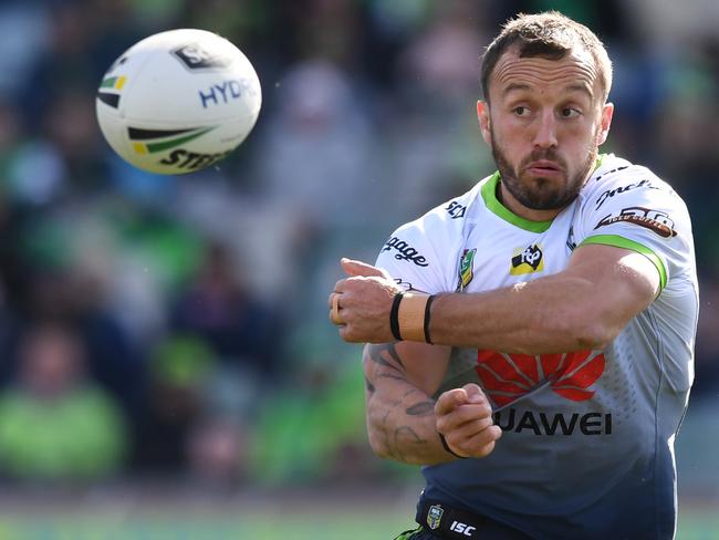 Josh Hodgson of the Raiders passes the ball during the Round 22 NRL match between the Canberra Raiders and the Wests Tigers at GIO Stadium in Canberra, Sunday, August 12, 2018. (AAP Image/Lukas Coch) NO ARCHIVING, EDITORIAL USE ONLY