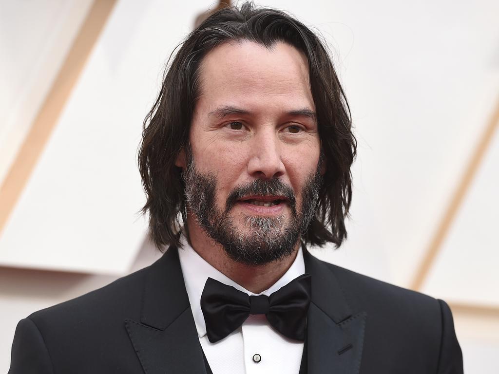 Nice suit, Keanu Reeves ... matches that hair perfectly. Picture: AP