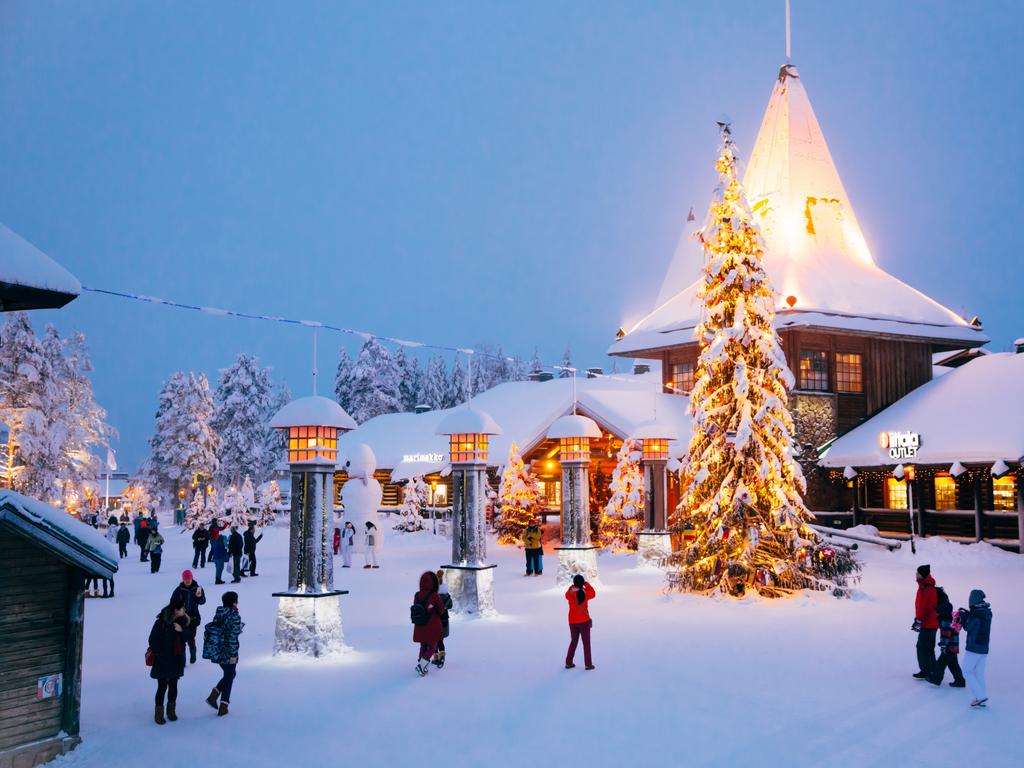 <p><b>LAPLAND, FINLAND</b> The home of Santa Claus himself, <a href="https://www.escape.com.au/destinations/europe/swedish-lapland-the-best-in-the-world-to-see-northern-lights/news-story/3199247b8e65b90a3f9379c91017de5d" target="_blank" rel="noopener">Lapland</a> is without a doubt the most festive place on Earth. Around Christmas, most of Lapland experiences days and even weeks without sunlight &ndash; which makes a visit to the charming twinkle light village of <a href="https://www.visitrovaniemi.fi/" target="_blank" rel="noopener">Rovaniemi</a> (pictured) even more magical.<br><b>PRO TIP:</b> For the ultimate magical getaway, opt for a stay at the <a href="https://travel.escape.com.au/accommodation/detail/arctic-treehouse-hotel?HotelCode=29968502&amp;CurrencyCode=AUD&amp;Provider=Expedia&amp;GuestCounts%5B0%5D%5B0%5D%5BAgeQualifyingCode%5D=10&amp;GuestCounts%5B0%5D%5B0%5D%5BCount%5D=2" target="_blank" rel="noopener">Arctic Treehouse Hotel</a>, where you can experience uninterrupted views of the Northern Lights from the comfort of your own bed.</p>