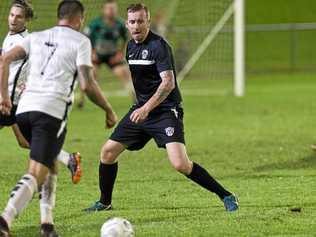 CLOSE ATTENTION: Willowburn White's Matthew Donovan moves to shut down his Willowburn FC opponent during a match earlier this season. New to the TFL Premier Men division's Willowburn White have shown solid early season form - running third. Picture: Kevin Farmer