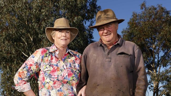 Chris and Kim Whale on their farm in Gollan which will soon have up to 10 wind turbines on their land. Picture: Jonathan Ng