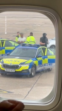 Passenger removed from plane amid bomb threat