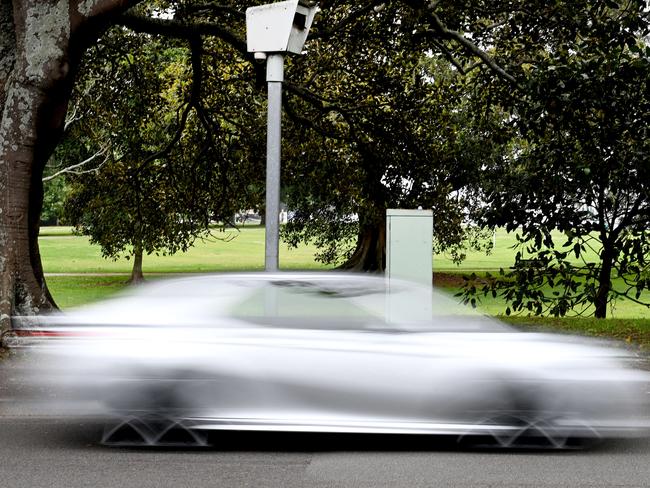 SYDNEY, AUSTRALIA - NewsWire Photos NOVEMBER 30, 2021: Motorists drive past a fixed speed camera as concerns the NSW government's decision to remove warning signs from mobile speed cameras  was a revenue raising exercise.Picture: NCA NewsWire / Jeremy Piper