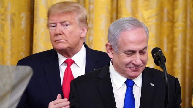 Donald Trump and Israeli Prime Minister Benjamin Netanyahu take part in an announcement of Trump's Middle East peace plan in 2020. Picture: AFP.