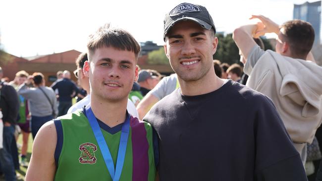Tyson Gresham of Parade College with his brother Jade after winning the Herald Sun Shield Grand Final last year. Daniel Pockett/AFL Photos/via Getty Images)