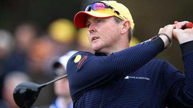 2013: Jarrod Lyle tees off during the first round of the Australian Masters at Royal Melbourne. AFP/William West