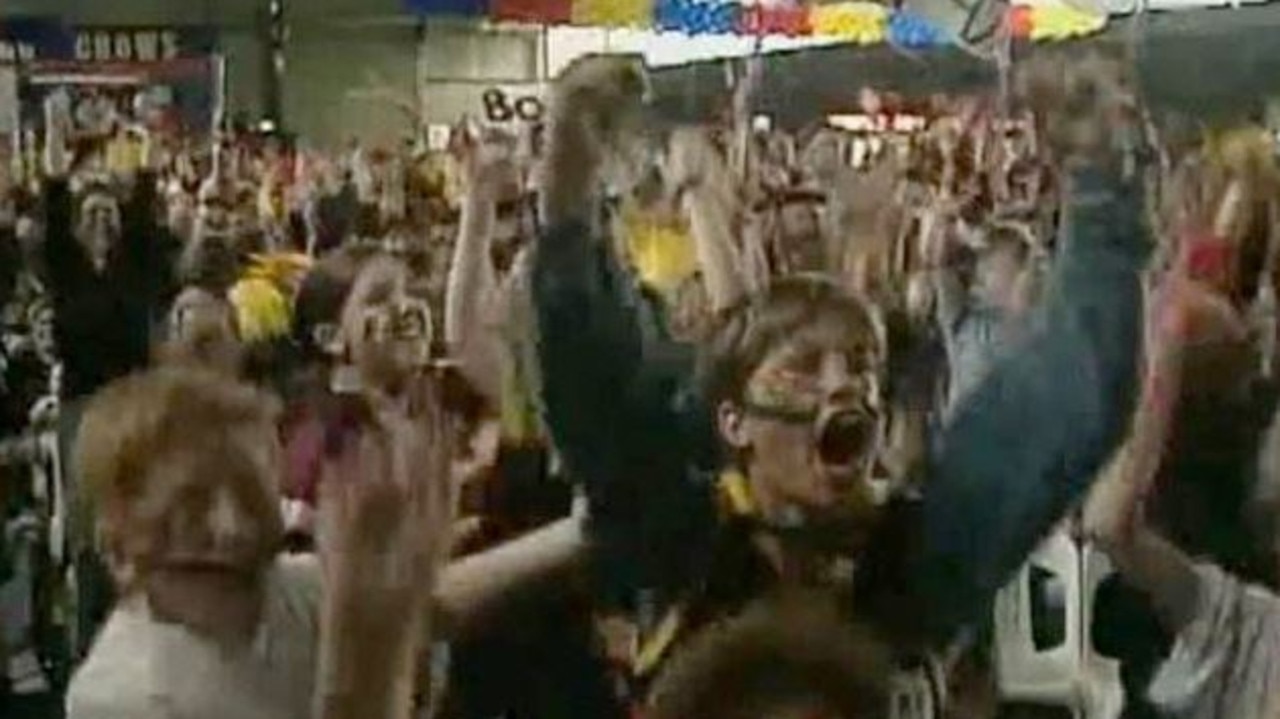 Young Adelaide supporter Andrew Mackie watching the 1997 Grand Final.