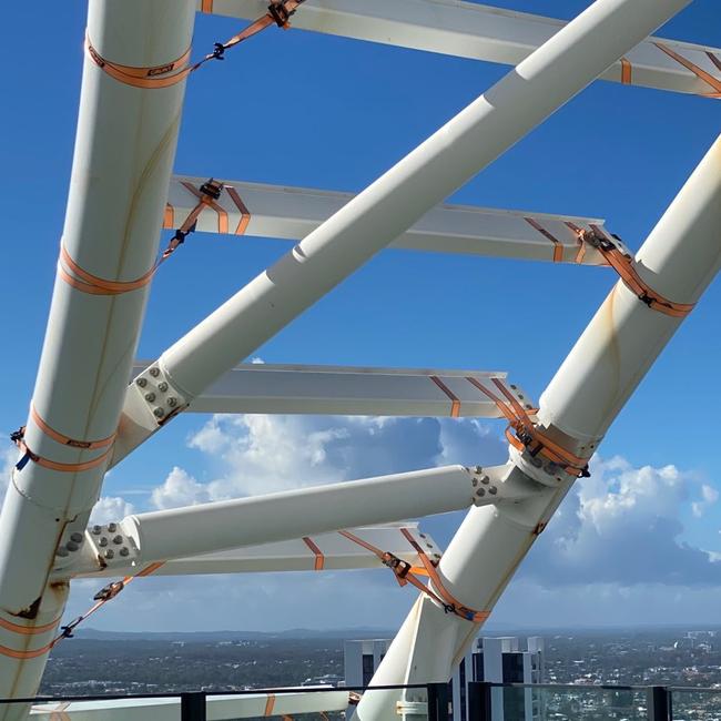 Ratchet straps covering a structure on top of The Oracle Hinterland Tower at Broadbeach. Picture: Supplied