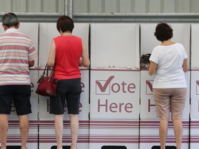 Cairns constituents turn out to cast their votes in the Queensland local council election. General, generic stock photo of people voting at Edge Hill state school. PICTURE: BRENDAN RADKE