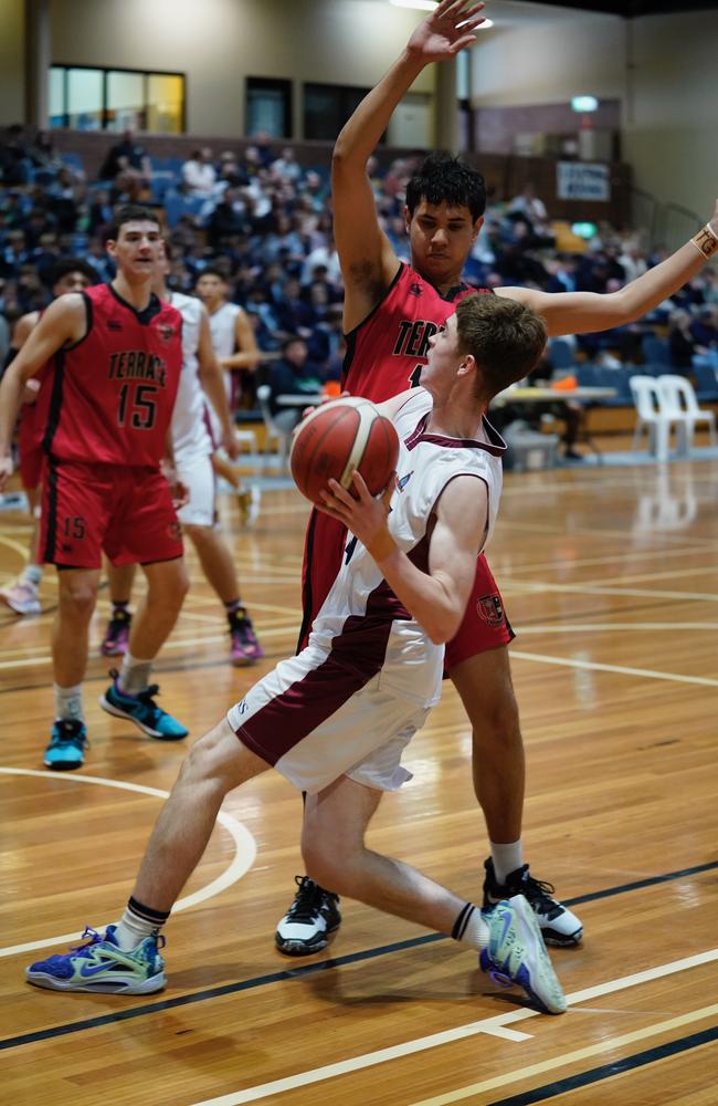 Tama Tuhi guarding Jack Foley. Pic Heidi Brinsmead