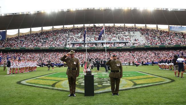 The annual Anzac Day game between the Roosters and Dragons is an emotional affair. Image. Phil Hillyard