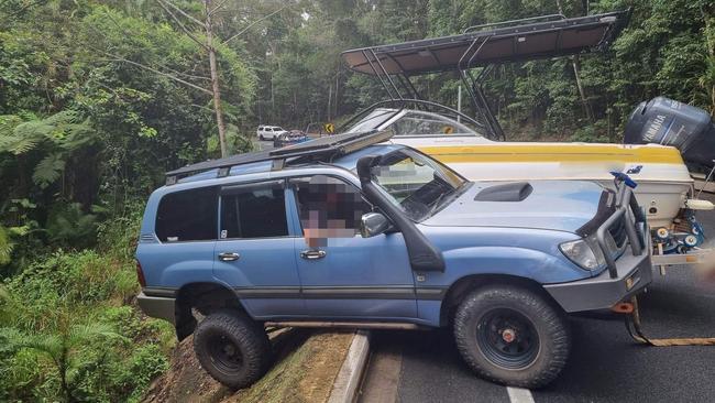 A four-wheel drive towing a boat jackknifed on the Kuranda Range Road on Monday afternoon. Picture: Facebook