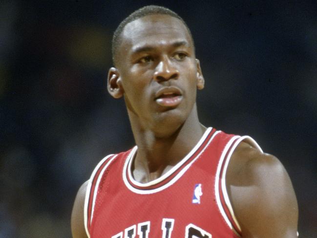 LANDOVER, MD - CIRCA 1986: Michael Jordan #23 of the Chicago Bulls looks on against the Washington Bullets during an NBA basketball game circa 1986 at the Capital Centre in Landover, Maryland. Jordan played for the Bulls from 1984-93 and 1995 - 98. (Photo by Focus on Sport/Getty Images) *** Local Caption *** Michael Jordan