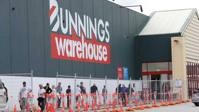 Eager shoppers queue at Bunnings Warehouse in North Geelong during stage three lockdown restrictions. Picture: Peter Ristevski