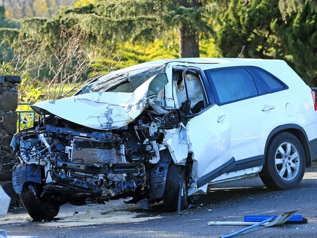 The driver was initially believed to be trapped inside the car. Picture: Mark Stewart