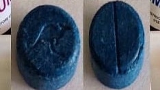 An ecstasy tablet stamped with the Qantas "Flying Kangaroo" logo.