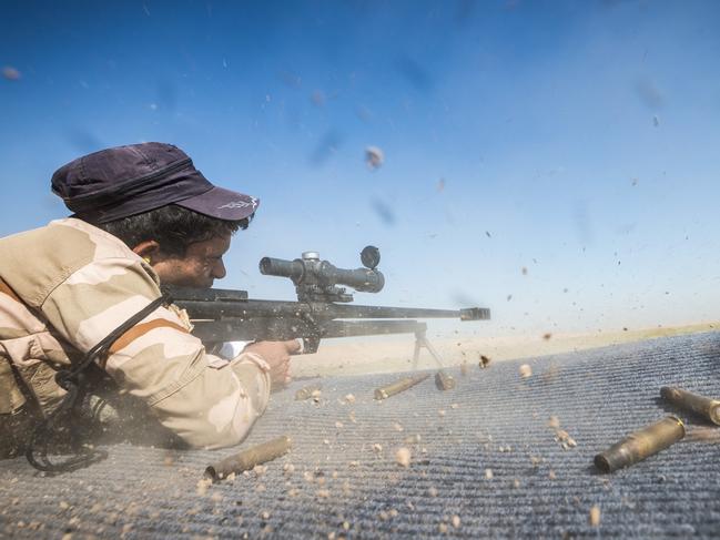 An Iraqi Army soldier fires a rifle during advanced marksmanship training at Taji Military Complex, Iraq. Picture: Defence Media