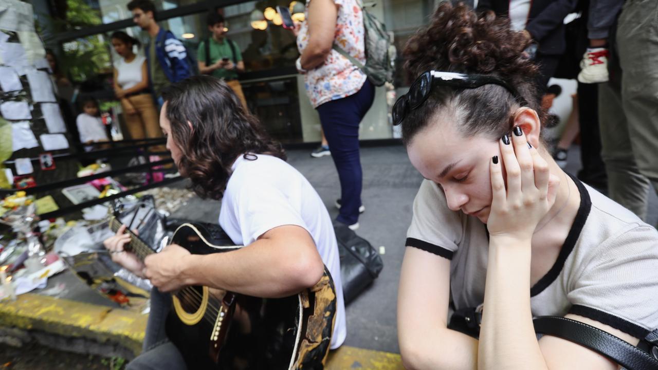 Fans mourn at a memorial in tribute to former One Direction singer Liam Payne after his death outside Casa Sur Picture: Marcos Brindicci/Getty Images