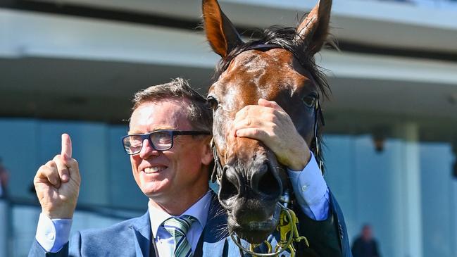 Trainer David Vandyke poses with Alligator Blood. Picture: AAP/Vince Caligiuri