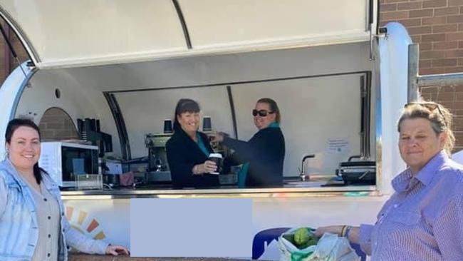 Kate Fraser at Scone Neighbourhood Resource Centre breakfast van chatting with staff Monica and Jaala and customer Shannon Markham. Supplied.