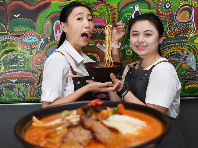 A Territory favourite, the laksa, will soon feature in its own festival ... Rendezvous Cafe staff members Ceclilia Huang and Raven Young are looking forward to it. Picture: Katrina Bridgeford