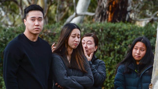 Mourners at the scene of a fatal in Athelstone that killed two local 17 year old boys. Picture: Brenton Edwards