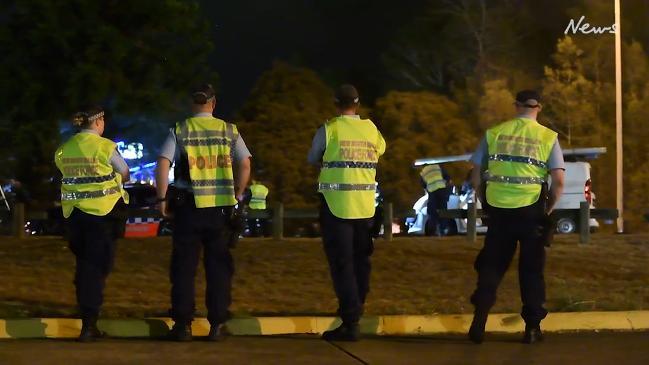 Police investigating after two officers hit by a van at Campbelltown