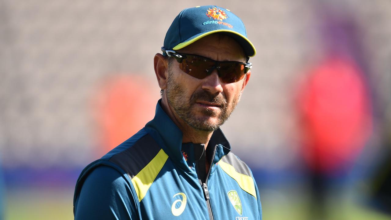 Australia's head coach Justin Langer joins his players during warm-up ahead of the 2019 Cricket World Cup warm up match between Australia and Sri Lanka at the Rose Bowl in Southampton, southern England, on May 27, 2019. (Photo by Glyn KIRK / AFP)